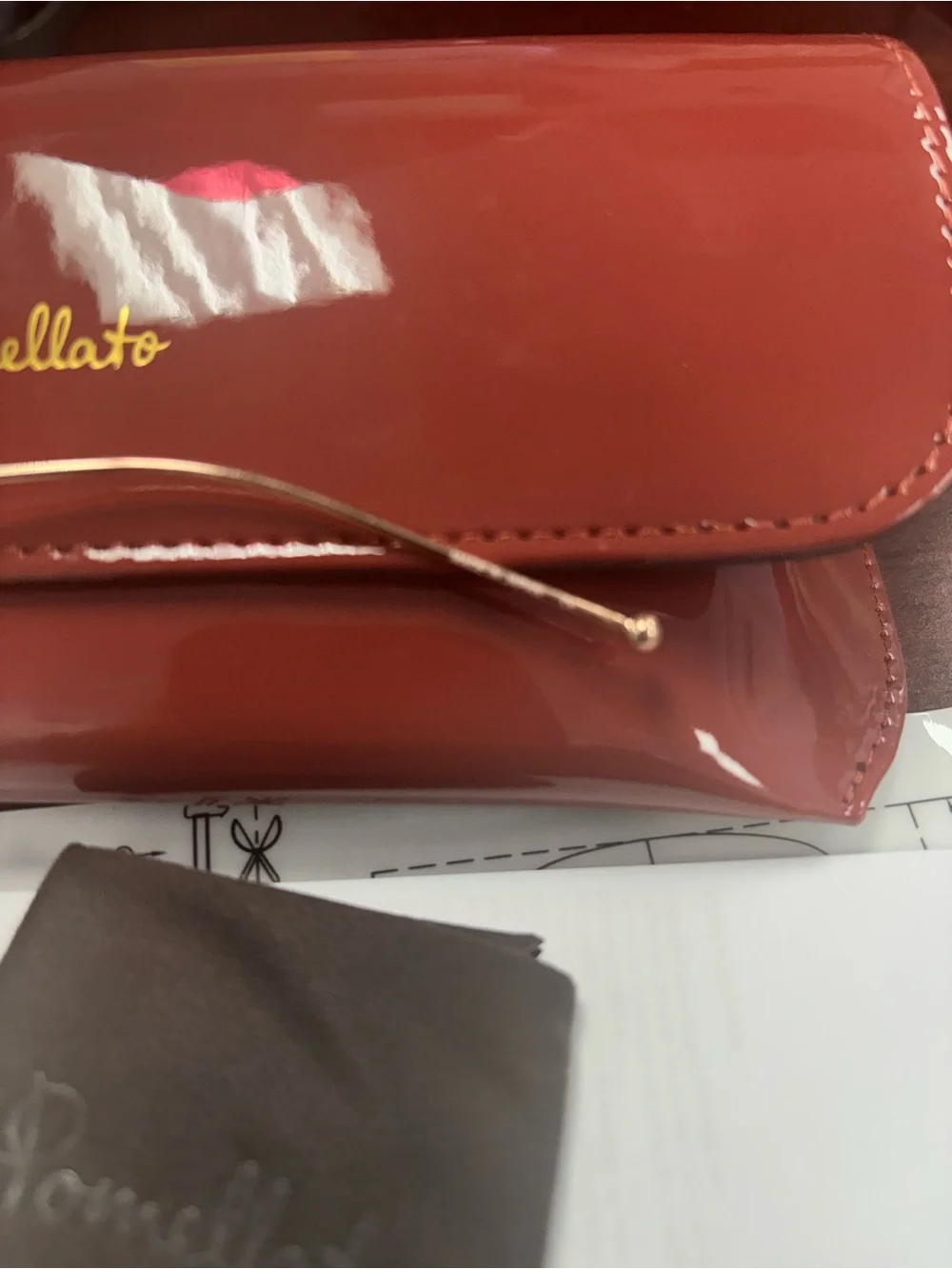 Pomellato Gold Rimless Glasses with Red Case